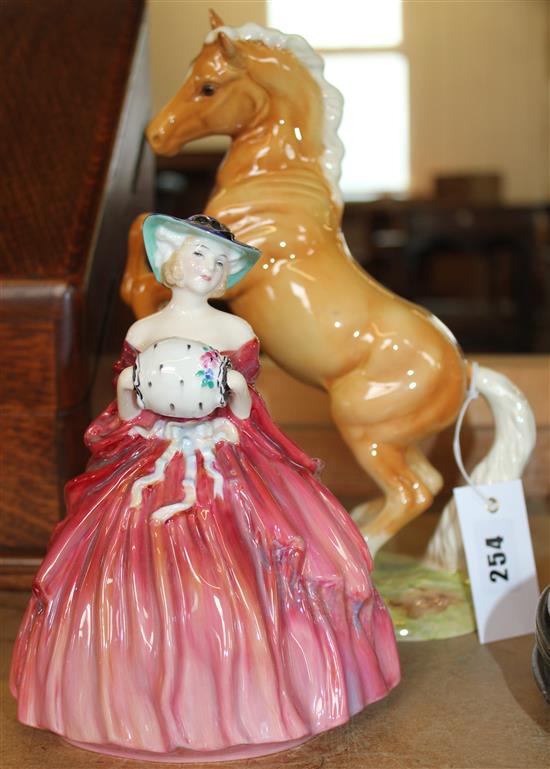 Beswick figure of horse & Doulton female figure